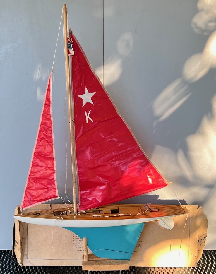 Sailboat with Red Sail